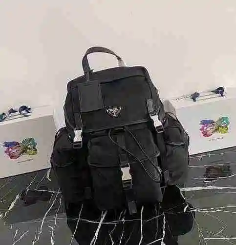 PRADA Mochila Prada para hombre hecha de material de lona importado, bolsa de regalo con entrega de 