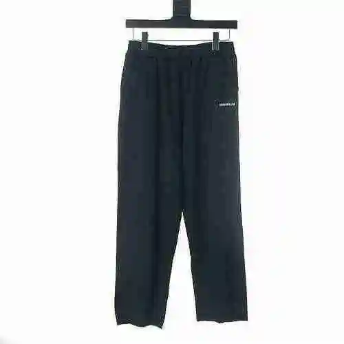 BALENCIAGA/Balenciaga BLCG PANTALONES CROPPED CON BAJO SIN CRUTAR BORDADOS CON LETRAS INVERSAS