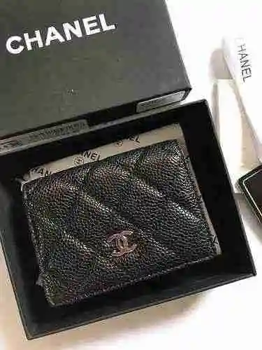 El clip de billetera femenina está hecho de piel de vaca original importada, con una bolsa de regalo
