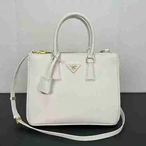 El bolso está hecho de piel de vaca original importada, con una bolsa de regalo de entrega de alta c
