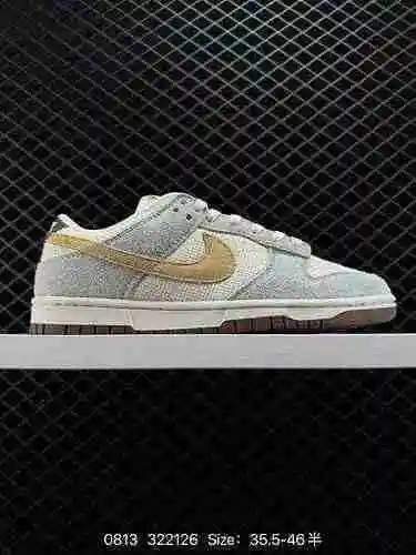 El zapato 3 Nike Dunk Low Nike SB de corte bajo gris amarillo presenta tela beige como tono de color