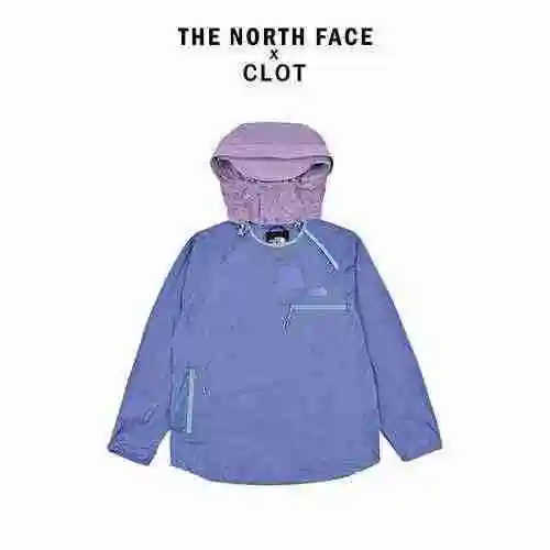 Chaqueta cortavientos con capucha y logo bordado SS23 de la marca THE NORTH FACE xCLOT Co. Protector
