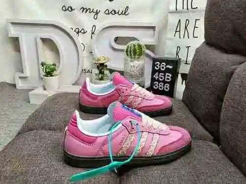The 386DWales Bonner X Adidas Samba co branded retro sneaker features a simple color scheme paired w