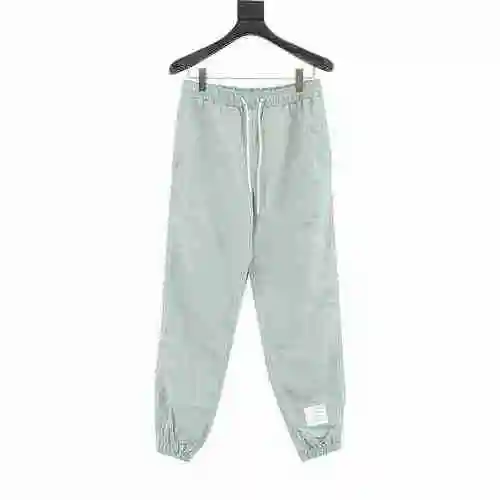 TB line nylon woven sports pants