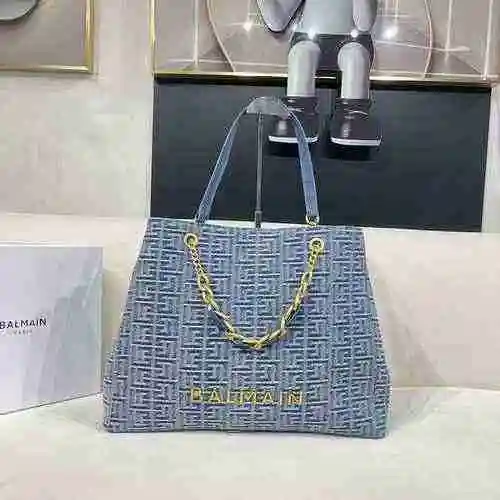 La bolsa de compras está hecha de material de lona importado, con una bolsa de regalo de entrega de 