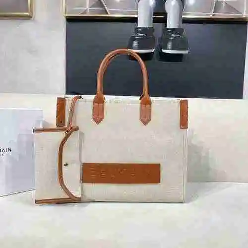 La bolsa de compras está hecha de material de lona importado, con una bolsa de regalo de entrega de 