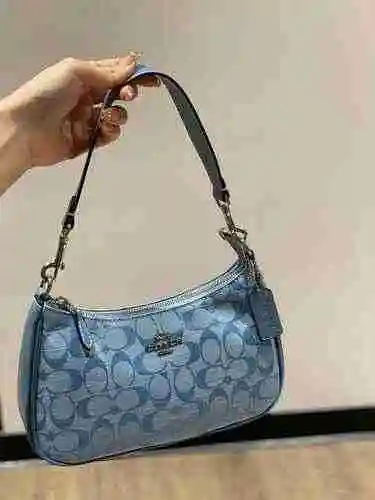La bolsa para las axilas está hecha de piel de vaca original importada, con una bolsa de regalo de e