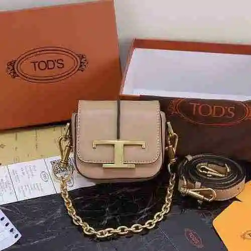 El bolso de cadena está hecho de piel de vaca original importada, con una bolsa de regalo de entrega