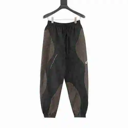 1V patchwork vintage logo sports pants