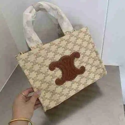 La bolsa de compras está hecha de material de lona importado, con una bolsa de regalo de entrega de 