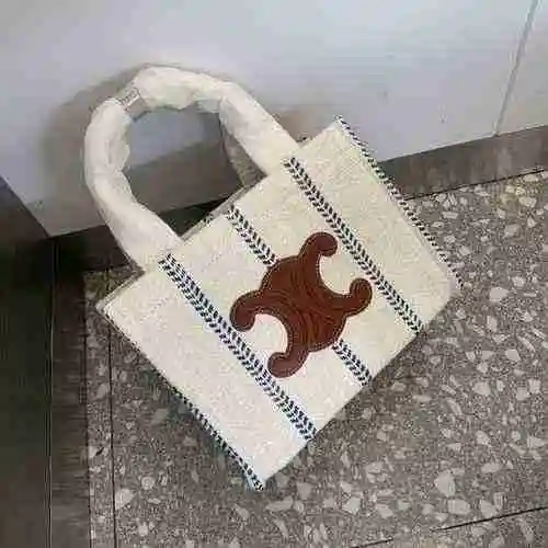La bolsa de compras está hecha de material de lona importado, con una bolsa de regalo de entrega de 