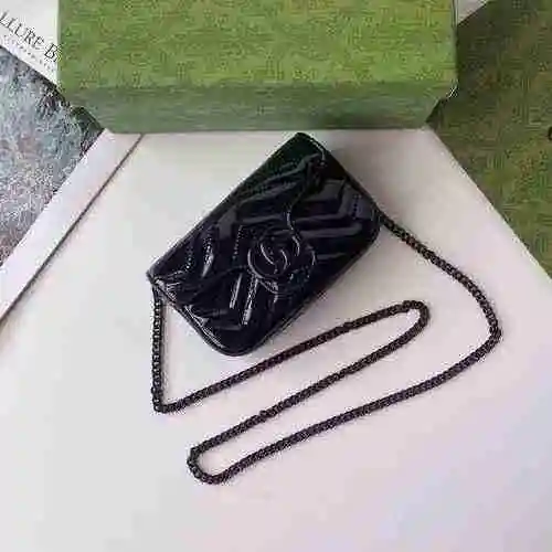 El bolso con cadena GUCCI Gucci está hecho de material de lona importado con una bolsa de regalo de 