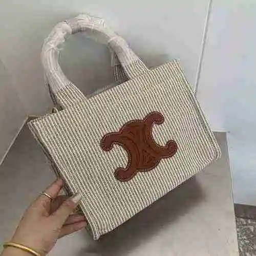 La bolsa de compras está hecha de material de lona importado, con una bolsa de regalo de entrega de 
