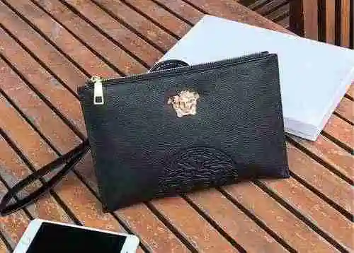 El único bolso para hombre está hecho de piel de vaca original importada y una bolsa de regalo de en
