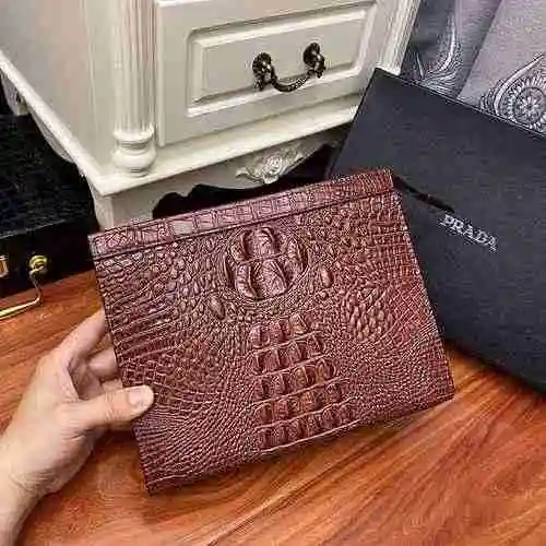 El bolso exclusivo para hombres está hecho de piel de vaca original importada y una bolsa de regalo 