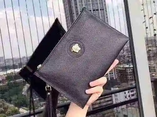El único bolso para hombre está hecho de piel de vaca original importada y una bolsa de regalo de en