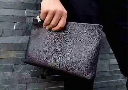 El único bolso para hombre está hecho de piel de vaca original importada y una bolsa de regalo de en