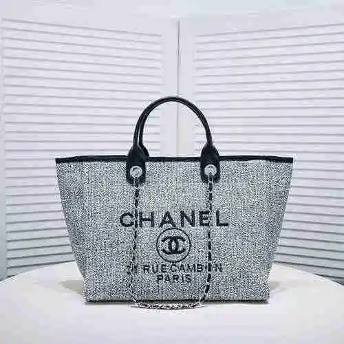 La bolsa de playa está hecha de material de lona importado, con una bolsa de regalo de entrega de al