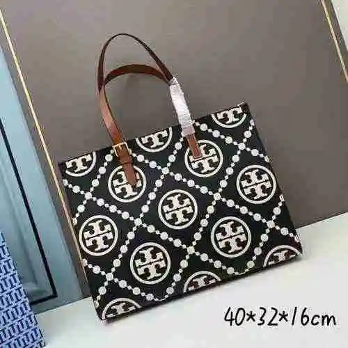 El bolso de hombro Tori Birch está hecho de cuero original importado de primer nivel y una versión r
