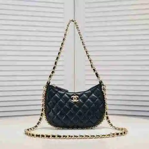El bolso de cadena está hecho de piel de vaca original importada, con una bolsa de regalo de entrega
