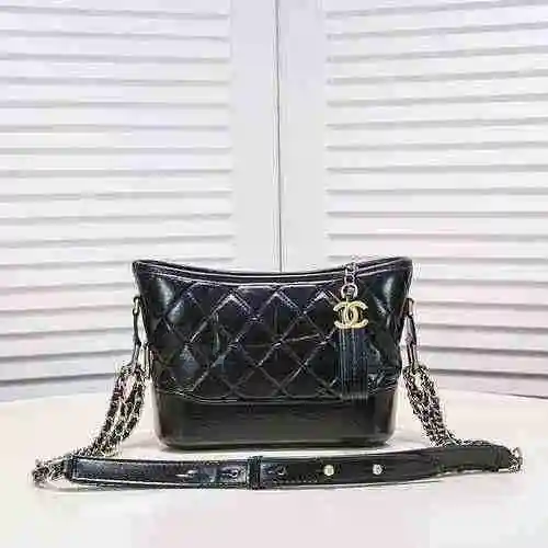 El bolso cruzado está hecho de piel de vaca original importada, con una bolsa de regalo de entrega d