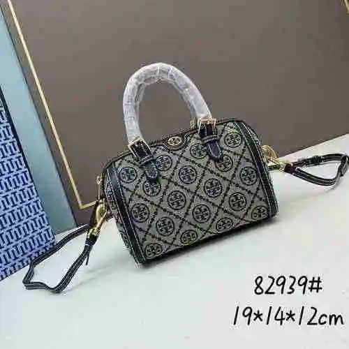 El bolso Tori Birch está hecho de material de lona importado, con una bolsa de regalo de entrega de 