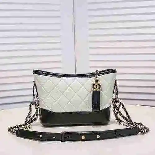 Chanel Bolso errante Chanel hecho de material de lona importado, bolsa de regalo de entrega de alta 