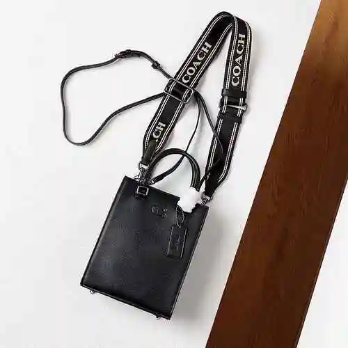 La bolsa Kouchi Qinpu está hecha de material de lona importado, con una bolsa de regalo de entrega d