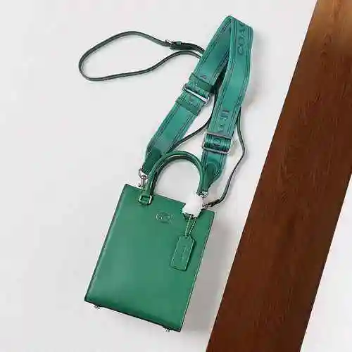 La bolsa Kouchi Qinpu está hecha de material de lona importado, con una bolsa de regalo de entrega d