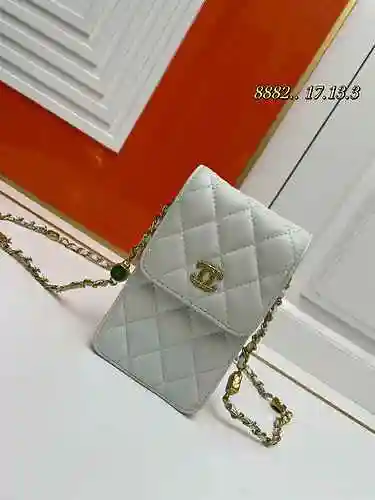 La bolsa para teléfono móvil está hecha de piel de oveja original importada, con una bolsa de regalo
