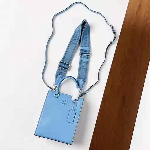 La bolsa Kouchi Qinpu está hecha de material de lona importado, con una bolsa de regalo de entrega d