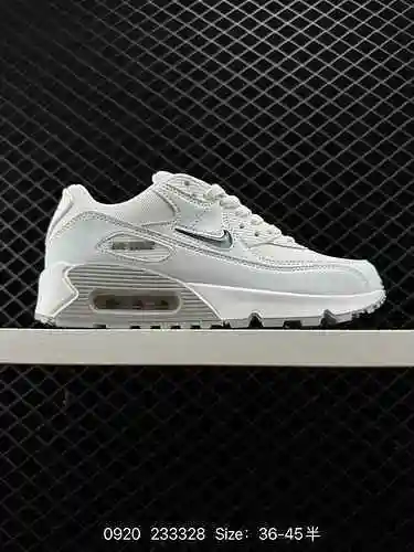 La parte superior de la zapatilla para correr con amortiguación de aire pequeña retro clásica Nike A