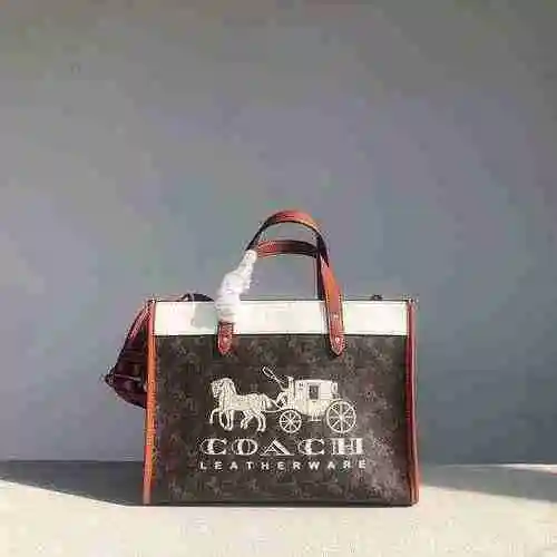 La bolsa de mano CH Kouchi está hecha de material de lona importado y es una bolsa de regalo de entr