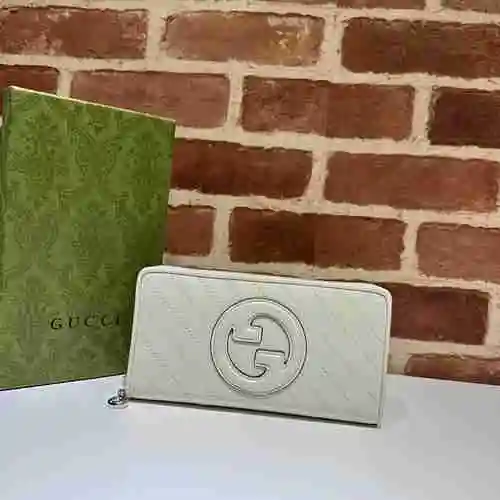 La billetera con clip largo GUCCI adopta una bolsa de regalo de entrega de alta calidad de piel de v