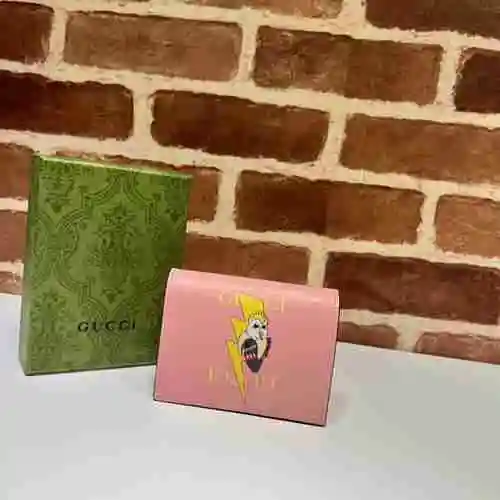 La billetera con clip corto de GUCCI adopta una bolsa de regalo de entrega de alta calidad de piel d