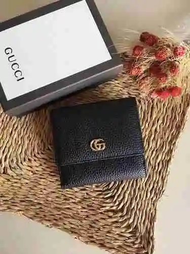 La billetera con clip corto de GUCCI adopta una bolsa de regalo de entrega de alta calidad de piel d