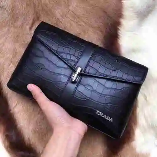 PR@ADA El bolso exclusivo para hombres está hecho de piel de vaca original importada y una bolsa de 