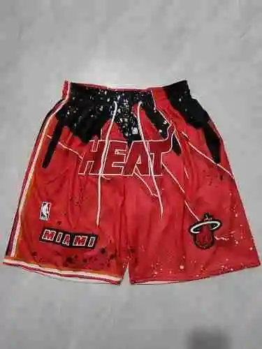 Pantalones de fútbol rojos con bolsillo oscilante