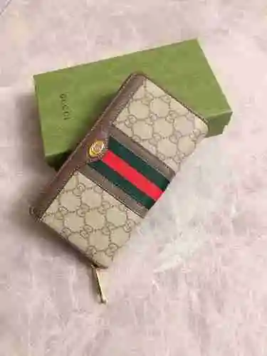 Cartera con clip largo GUCCI hecha de piel de vaca original importada Bolsa de regalo con entrega de