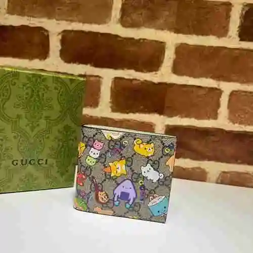 La billetera con clip corto de GUCCI adopta una bolsa de regalo de entrega de alta calidad de piel d