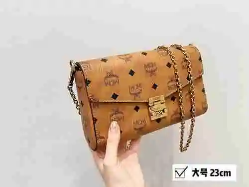 El bolso de cadena MCM adopta una bolsa de regalo de entrega de alta calidad de piel de vaca origina