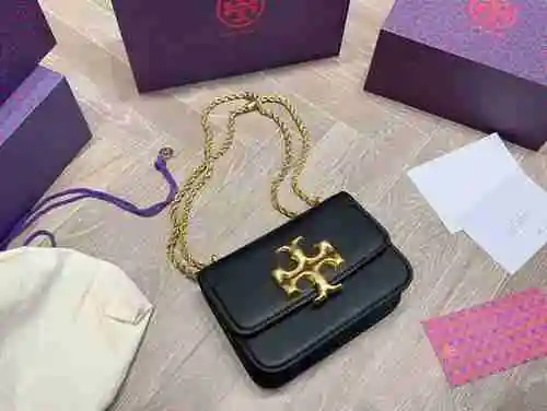 El bolso Tori Birch Chain está hecho de piel de vaca original importada y una bolsa de regalo de ent
