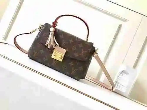 El bolso cruzado LV está hecho de una bolsa de regalo de entrega de alta calidad de piel de vaca ori