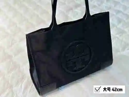 El bolso de hombro Tori Birch está hecho de piel de vaca original importada y una bolsa de regalo de