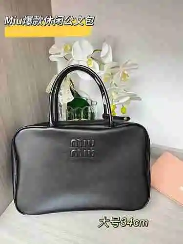 El maletín Miumiu adopta una bolsa de regalo de entrega de alta calidad de piel de vaca original imp