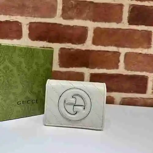 Cartera con clip corto GUCCI hecha de piel de vaca original importada Bolsa de regalo con entrega de