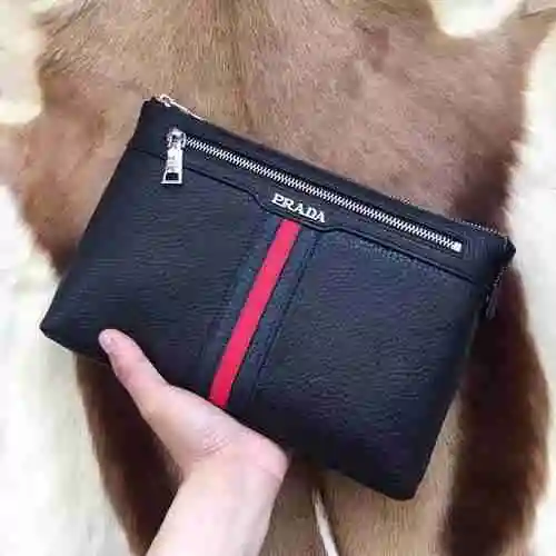 PR@ADA El único bolso de mano para hombre está hecho de piel de vaca original importada y una bolsa 