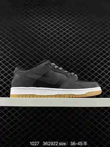 La parte superior Nike SB Dunk Low en gris neblina combina una base de cuero abatanado y una capa de