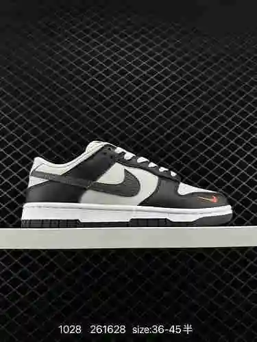La parte superior Nike Dunk Low Nike SB de corte bajo de 4 capas en negro, gris y naranja con un tam