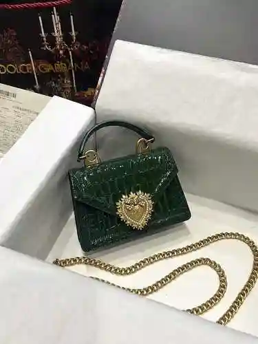El bolso D @ G está hecho de piel de vaca original importada y una bolsa de regalo con entrega de al